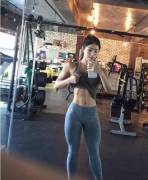 Fit Asian Girl Taking A Selfie