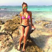 Cute Babe On The Rocks