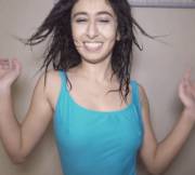 Slow-Mo Shake In Loose-Fitting Swimsuit