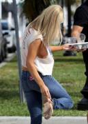 Adjusting Her Sandal: Sideboob