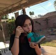 This Girl Eating Spaghetti Out Of A Shoe