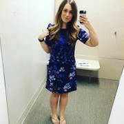 Trying On A Blue Dress