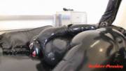 Spanking Latex Lucy's Rubber Encased Ass