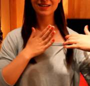 Sliding Her Thin Shirt Around Over Her Braless Nipples