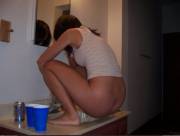 Crouched On The Sink