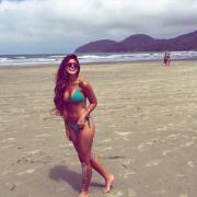 Sand On Her Leg, Smile On Her Face