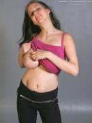 Lifting Her Top A Bit