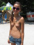 Huge Shades, Huge Earrings, And Tiny Tits.