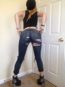 Tall Girl Posing In Ripped Jeans