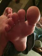 Wrinkled Soles And Red Toes