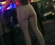 Asian Teen Playing Pinball