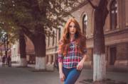 Gorgeous Redhead On A Tree Lined Street