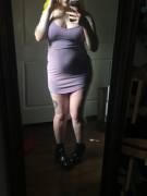 Stuffed Belly In A Tight Striped Dress