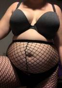 Filling Out Her Fishnets