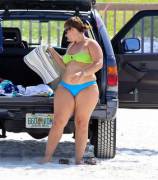 Thick Thighs And A Brightly Colored Bikini