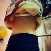 Yellow Jumper Underboob Holding Highlighter