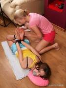 Cute Brunette Cuffed On The Ground