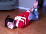 Brunette In White Tape