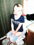 A Washed Out Photo Of A Girl Covering Herself