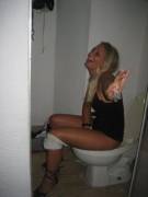 What Is She Holding?