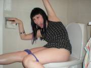Looks Like She's About To Fall Off Toilet