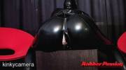 In Her Black Catsuit With Corset, Playing With Her Rubberized Body