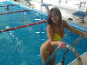 Slowly Lowering Herself Into The Water