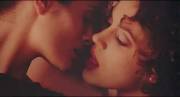 Alyssa Milano And Charlottle Lewis Kissing In Embrace Of The Vampires.