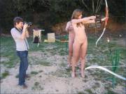 French Reporter Zita Lotis Shooting A Bow And Arrow Naked
