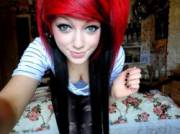 What's Red And Black And Poofy All Over?