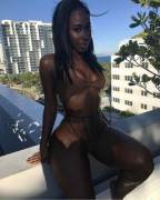 Bria Myles In Brown Swimsuit