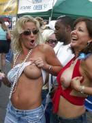 Friends Having A Blast At A Festival.