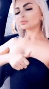 Revealing Her Pale Boobs In The Car