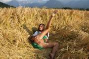Caprice In A Dirndl Spreading Her Legs In A Field