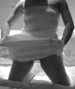 Wife Lifting Her White Dress