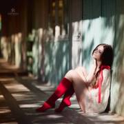 In Red Socks And A White Top