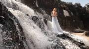 White Dress At A Waterfall