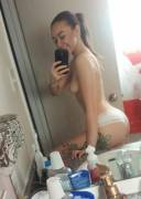 Showing Off Her Tattoo