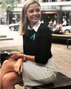 Wearing A Teal Ribbon To Support Women With Ovarian Cancer