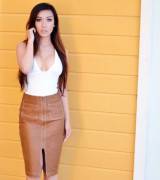 Lynn Chu In A Leather Skirt And Bodysuit