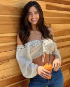 It's Not A Bikini Top, But She Looks Good.