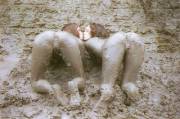 Girls Kissing In Mud.