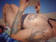 Reading On The Beach