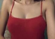 Pulling Down Her Tank Top