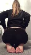 Taking Off Her Yoga Pants