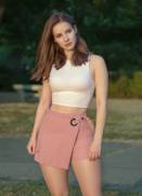 Casual Look In A Pink Skirt And White Top