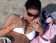 Cute Beach Girl Gets Embarrassed After Flashing Her Boobs [Gif]