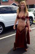 A Bartender Dressed As Slave Leia