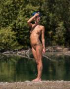 Showing Off Her Tattoos In Nature