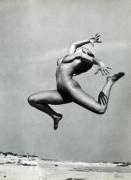 Dancer In High Leap Above The Sand By André De Dienes, 1960